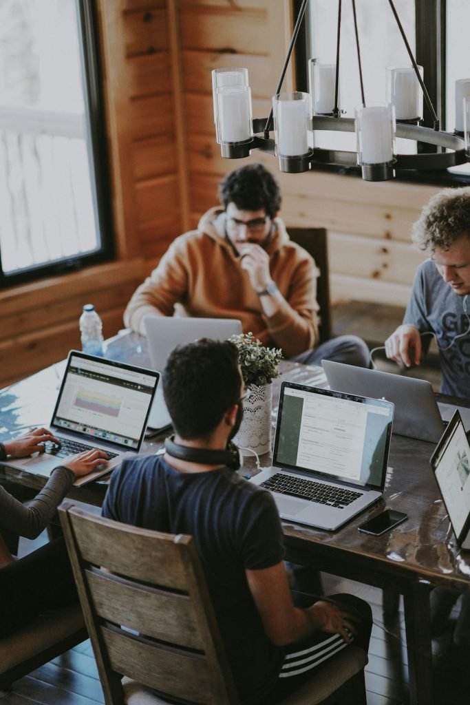 Engineers working at their desks in a shared office
