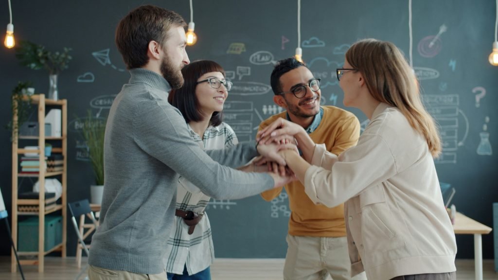 A team celebrating together in an office