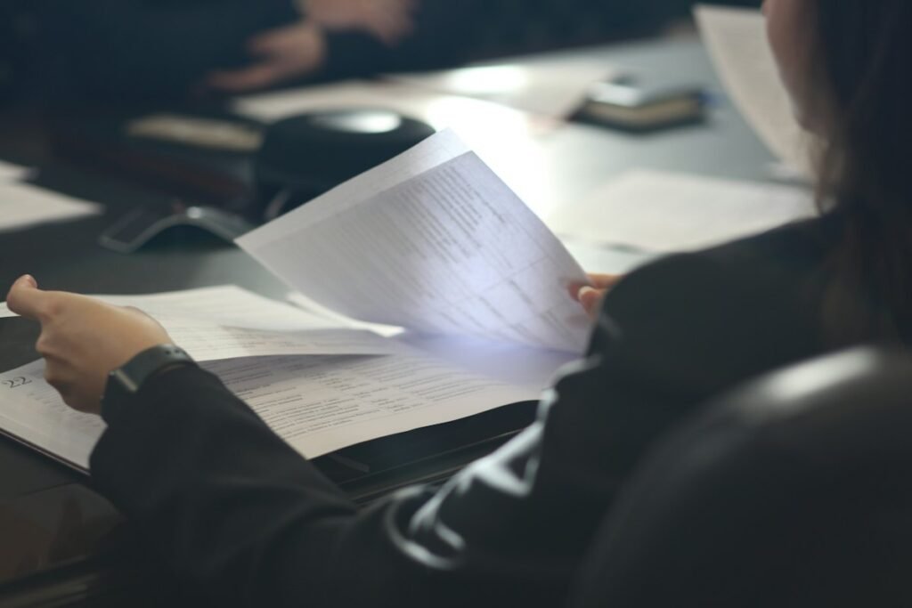 A reviewer reading a written evaluation