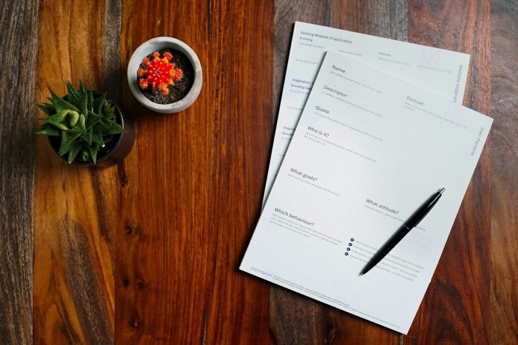 A printed resume and notes on a desk